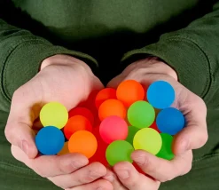 120 mini balles neon rebondissantes Ø 2.5 cm caoutchouc souple