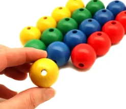 Boule percée 3 cm couleur jaune en bois - grosse perle hêtre diamètre 30 mm trou 6 mm