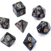 Set 7 dés multi-faces noirs nacrés chiffres or