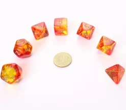 Set 7 dés multi-faces rouge et jaune translucide chiffres dorés