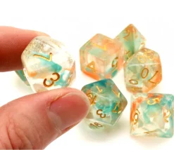Set 7 dés multi-faces translucide et vert pailletés